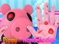 Permainan Piggy melayan tangannya  talian